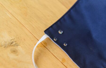 Drop of water on cloth mask for protect from covid-19 / cloth maskの写真素材