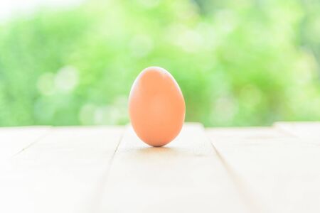 egges on wood plateの写真素材