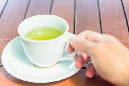 hot green tea on the tableの写真素材