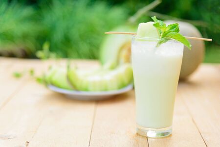 Milk melon Smoothie in glassの写真素材