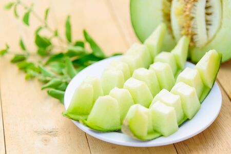 Fresh Green melon in the dishの写真素材