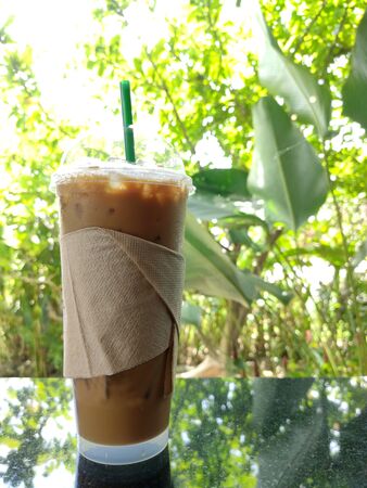 Ice coffee on the tableの写真素材