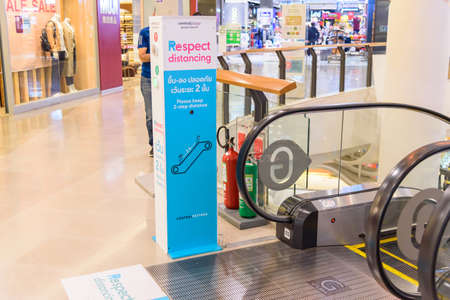 Bangkok , Thailand - 15 July, 2020 : Social distancing stage censor check at escalator of Central RAMA 9 super storeのeditorial素材