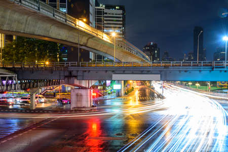 Blur light of traffic at Saladang junction in cityの写真素材