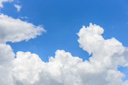 White cloud disappear in the hot sun on blue skyの写真素材