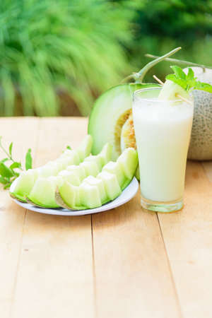 Milk melon Smoothie in glassの写真素材