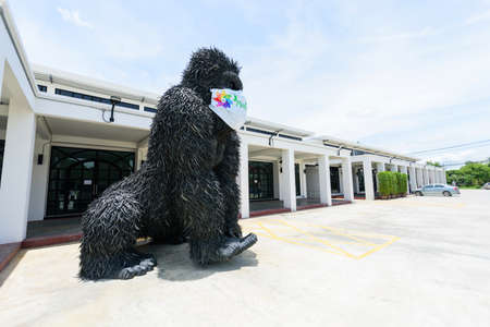 NakhonPathom , Thailand -  6  August, 2020 : Big Monkey gorilla model recycle made from old Car tire in  Caltex petrol station in NakhonPathom KM.14のeditorial素材