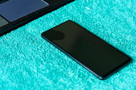 Apply the tempered glass itself to the screen of smart phoneの写真素材