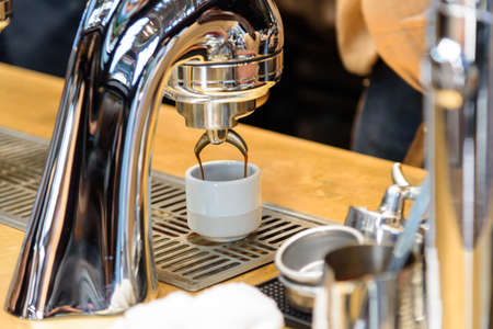 Closeup to Coffee making machine in the counter bar in coffee cafeの写真素材