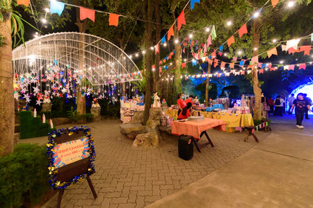Rachaburi,Thailand - 18 Decemmber, 2020: Food shop in the lighting show festival at NASATTA Park
