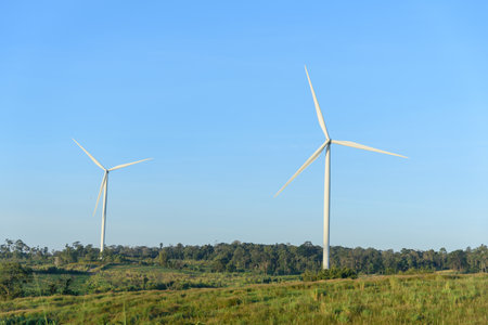 wind turbines park for make the electric power from wind in sunset timeの写真素材