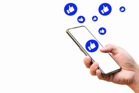 the man touch the screen for show Like emotion to social media on smartphoneの写真素材