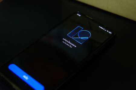 Rachaburi,Thailand - 21 February, 2021: Closeup focus to Smartphone model Mi9T updating MIUI android version 12 and Logo in reboot stepのeditorial素材