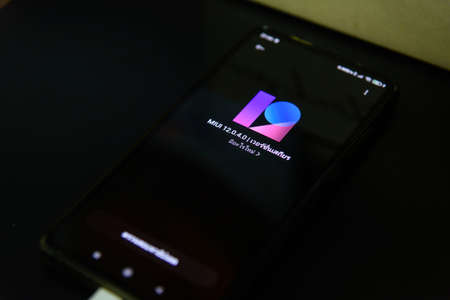 Rachaburi,Thailand - 21 February, 2021: Closeup focus to Smartphone model Mi9T updating MIUI android...