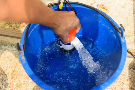 Testing bilge pump connected to use power from solar cell panelの写真素材