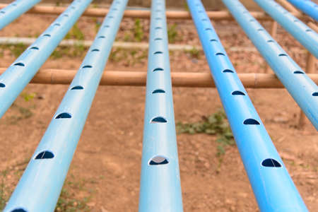 Perforated pvc pipe by HOLE SAW for use in D.I.Y hydroponics sytem of  vegetable gardenの写真素材
