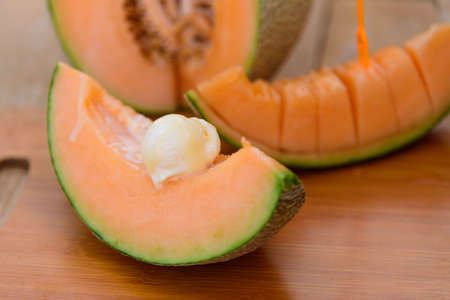 ice cream melon on wood tableの写真素材