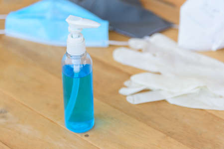 sanitizer gel for cleaning the hand and Medical rubber gloves on backgroundの写真素材