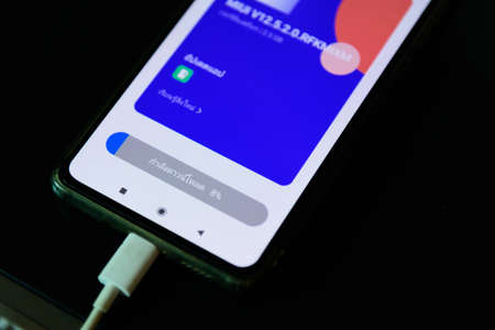 Rachaburi,Thailand - 15 Sep, 2021: Closeup focus to Smartphone model Mi9T updating MIUI versionのeditorial素材