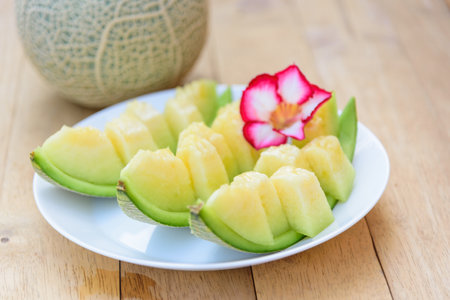 a piece of fresh green melon in dish