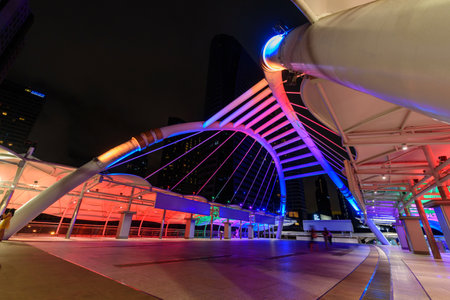 Bangkok , Thailand - 4 June, 2022: suspension bridge chongnonsi bridge landmark bridge with rainbow colors in night timeのeditorial素材
