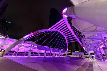 Bangkok , Thailand - 4 June, 2022: suspension bridge chongnonsi bridge landmark bridge with rainbow colors in night timeのeditorial素材