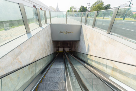 Bangkok,Thailand - Feb 5 , 2023 : Walking on Escalators Moving way into the underground tunnel Wat Phra Kaewのeditorial素材