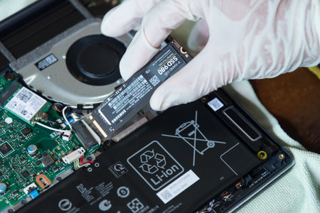 Bangkok,Thailand - May5 , 2023 : Closeup focus to SAMSUNG 980   M.2 NVMe SSD storage in the Asus vivobookのeditorial素材