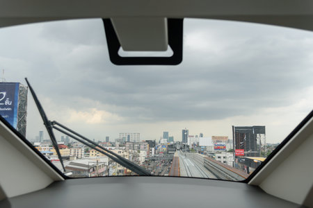 Bangkok,Thailand - 6June, 2023: View form front side of Thai electric monorail train yellow line trafficのeditorial素材