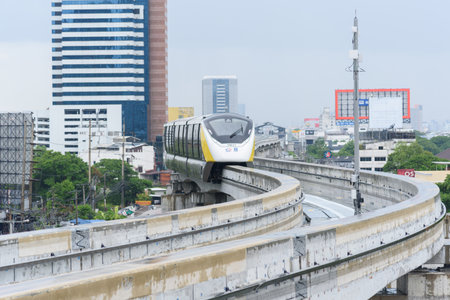 Bangkok,Thailand - 6June, 2023: Thai electric monorail train yellow line in Bangkokのeditorial素材