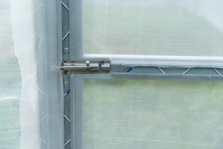 latch of the greenhouse of the farmの写真素材