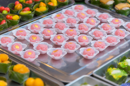 Ja mongkut is in the family of Thai desserts made of sweetened egg yolk in the trayの写真素材