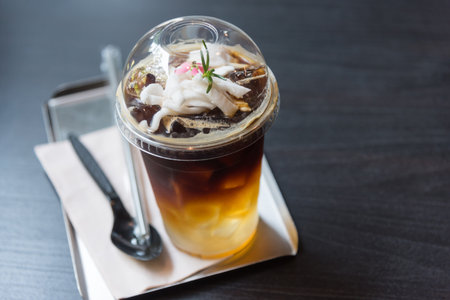 Closeup to Americano coconut on the tableの写真素材