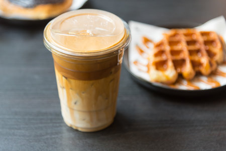 Ice coffee on the tableの写真素材