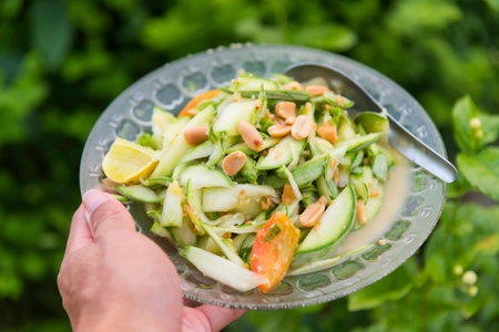 Young melon thai salad in white dishの写真素材