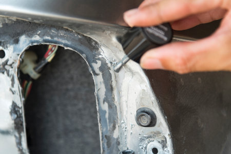 The man Wax and polish the car by handの写真素材
