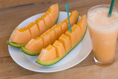 Milk melon Smoothie in glassの写真素材