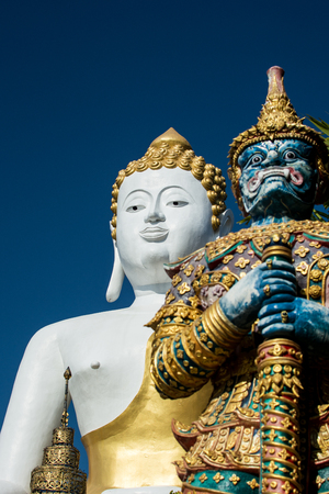 Buddha in Wat Phra That Doi Kham temple. The big Buddha is 17 meter high sitting Buddha image on hill top. Location is Mae Hia sub district Chiang Mai Thailandの写真素材