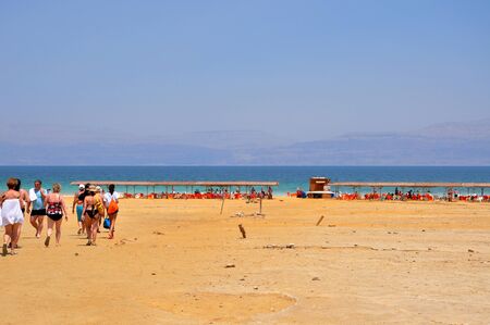 Israel, Photo taken at August 2012-A Tourists going to take a deep in the Dead seaのeditorial素材