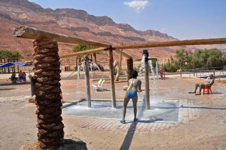 Israel, Photo taken at August 2012-A tourist having a shower After taking a mud bath のeditorial素材