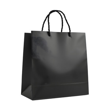 Black glossy shopping bag with handles isolated on transparent backgroundの素材