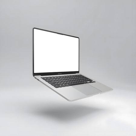 A modern silver laptop computer with a blank white screen and keyboard, floating in a neutral gray studio environment, isolated on white backgroundの素材