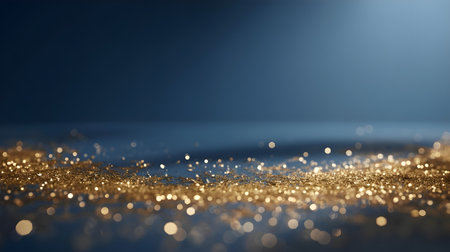 Soft focus golden bokeh lights against a dark blue backgroundの素材