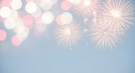 Soft focus fireworks display with bokeh lights in pastel colorsの素材