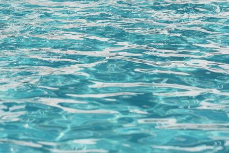 Cyan Swimming Pool water surface backgroundの写真素材