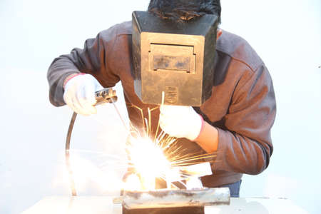 worker welding steel