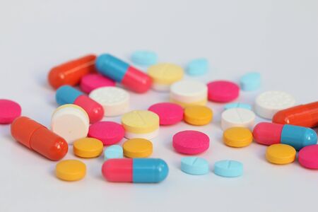 Spilled pills of drug or alimentary supplement.の写真素材