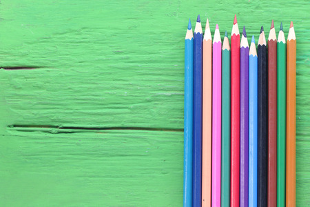 Colored pencils on wood green.の写真素材