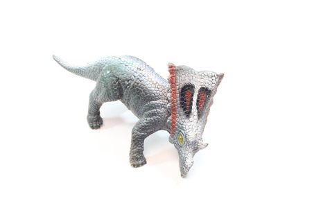Triceratops dinosaur toy isolated over white backgroundの写真素材