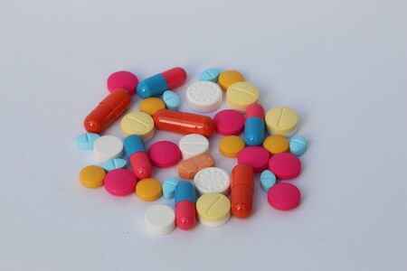 Spilled pills of drug or alimentary supplement.の写真素材